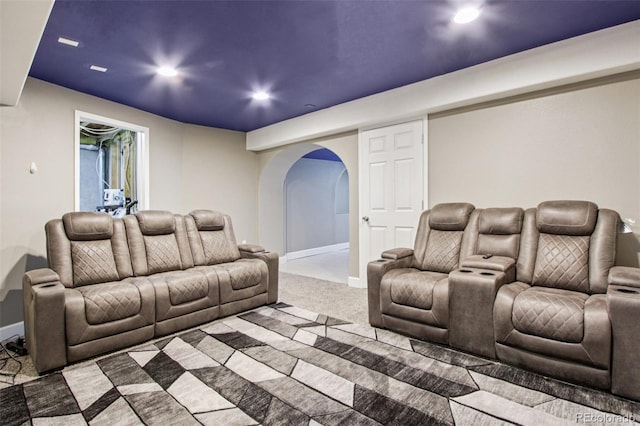 19677 E Vassar Dr, Aurora, CO 80013 - carpeted home theater featuring arched walkways and recessed lighting
