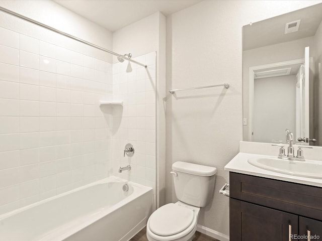 bathroom with  shower combination, toilet, vanity, and visible vents