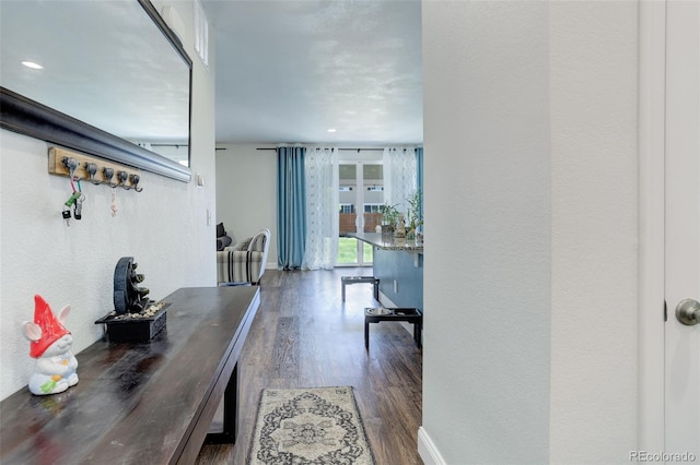 hallway featuring dark wood-type flooring