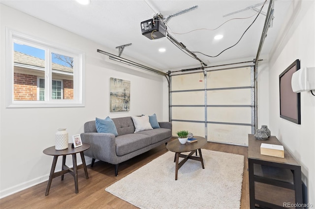 garage featuring baseboards and a garage door opener