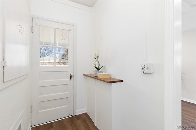 doorway featuring dark wood-style flooring