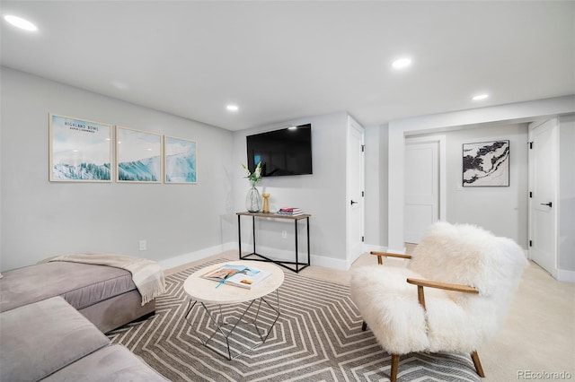 living room with light carpet, baseboards, and recessed lighting