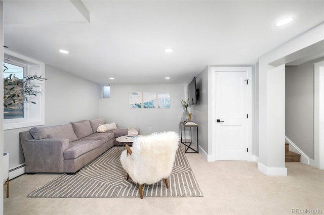 living room featuring recessed lighting, light colored carpet, baseboard heating, baseboards, and stairs