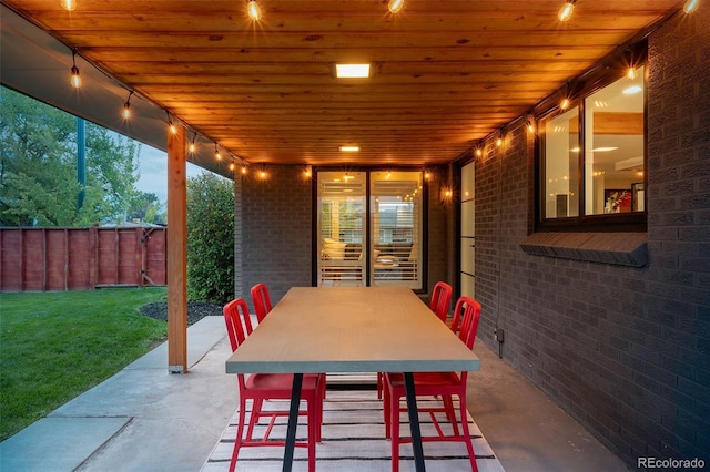 view of patio / terrace featuring outdoor dining space and fence