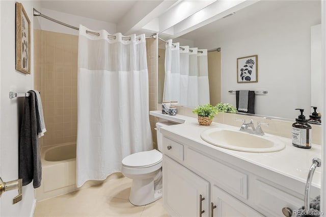9400 E Iliff Ave Unit 292, Denver, CO 80231 - bathroom featuring vanity, shower / bath combo with shower curtain, and tile patterned flooring