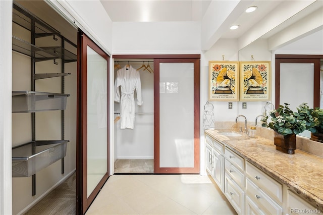 9400 E Iliff Ave Unit 292, Denver, CO 80231 - bathroom featuring vanity and recessed lighting
