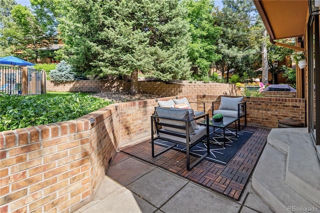 9400 E Iliff Ave Unit 292, Denver, CO 80231 - view of patio with an outdoor hangout area