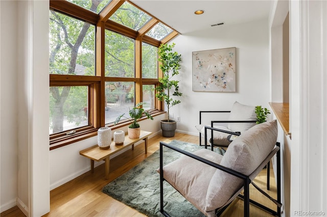 9400 E Iliff Ave Unit 292, Denver, CO 80231 - sitting room featuring wood finished floors and a skylight