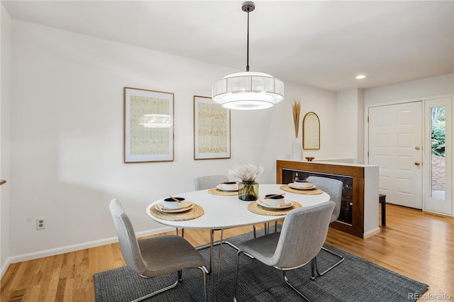 9400 E Iliff Ave Unit 292, Denver, CO 80231 - dining area with light wood-style floors and recessed lighting