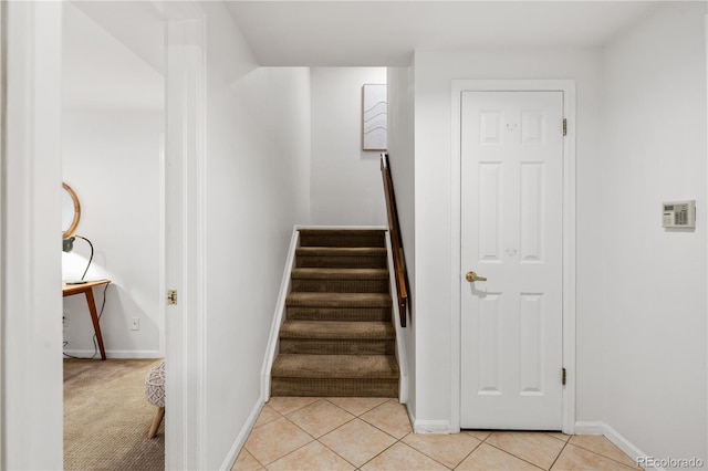 9400 E Iliff Ave Unit 292, Denver, CO 80231 - stairway with baseboards and tile patterned floors