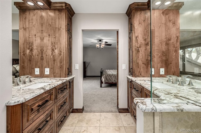 6740 S Windermere St, Littleton, CO 80120 - bathroom featuring ensuite bathroom, vanity, ceiling fan, and baseboards