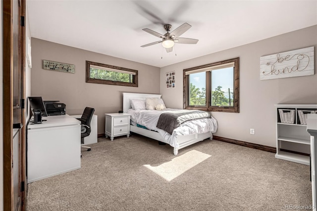 6740 S Windermere St, Littleton, CO 80120 - carpeted bedroom with a desk, baseboards, and a ceiling fan