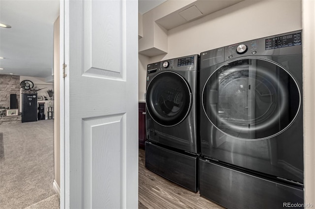 6740 S Windermere St, Littleton, CO 80120 - laundry area featuring washing machine and dryer and carpet