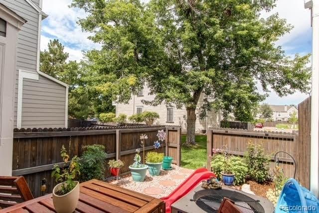 view of patio / terrace with a fenced backyard and cooling unit