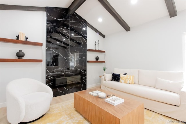 living room featuring a high end fireplace, vaulted ceiling with beams, and recessed lighting