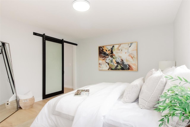 bedroom with a barn door