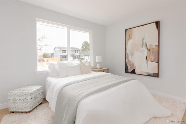 bedroom with baseboards