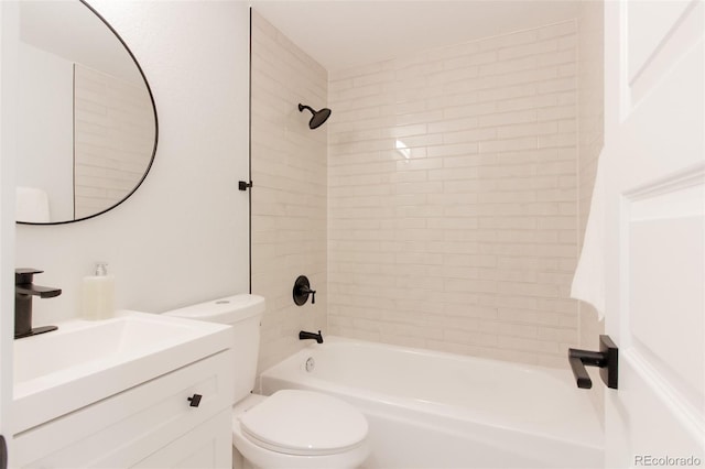 bathroom featuring toilet, shower / tub combination, and vanity