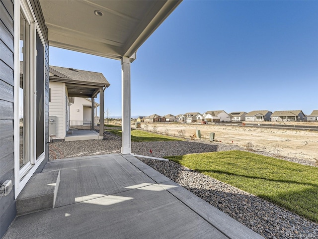 view of patio featuring a porch