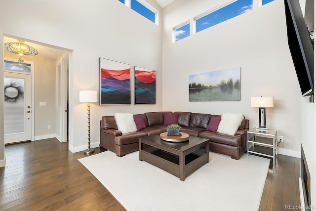 1882 W 67th Ave, Denver, CO 80221 - living room featuring dark wood-style floors and a high ceiling