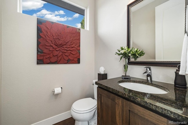1882 W 67th Ave, Denver, CO 80221 - bathroom with vanity and wood finished floors