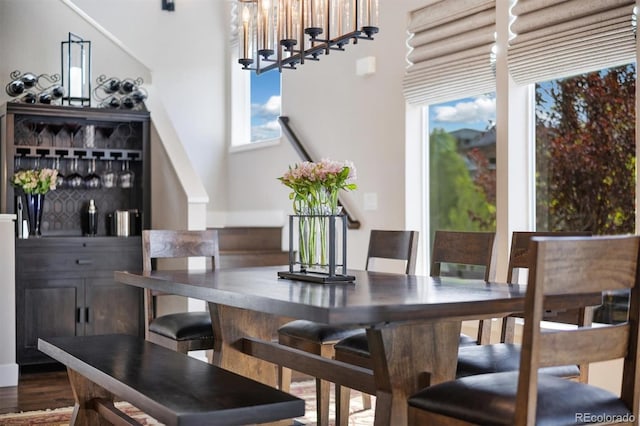 1882 W 67th Ave, Denver, CO 80221 - dining space with a chandelier and wood finished floors