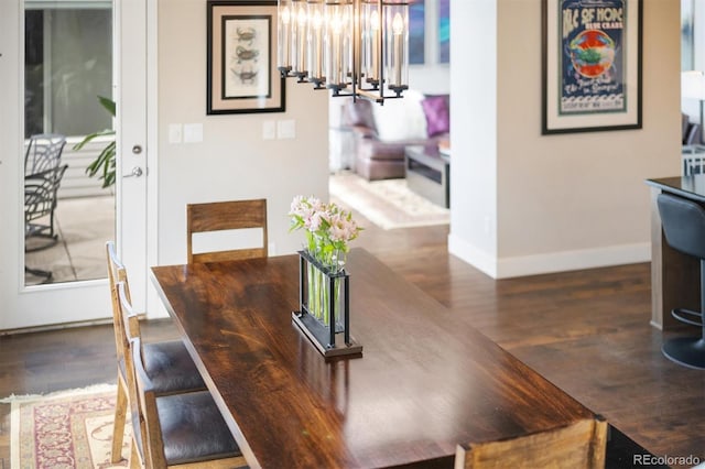 1882 W 67th Ave, Denver, CO 80221 - dining area with a chandelier and dark wood-style floors