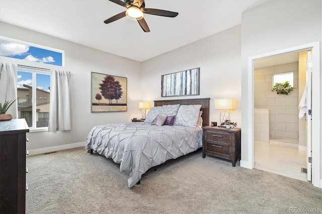 1882 W 67th Ave, Denver, CO 80221 - bedroom with carpet floors, ensuite bathroom, and a ceiling fan