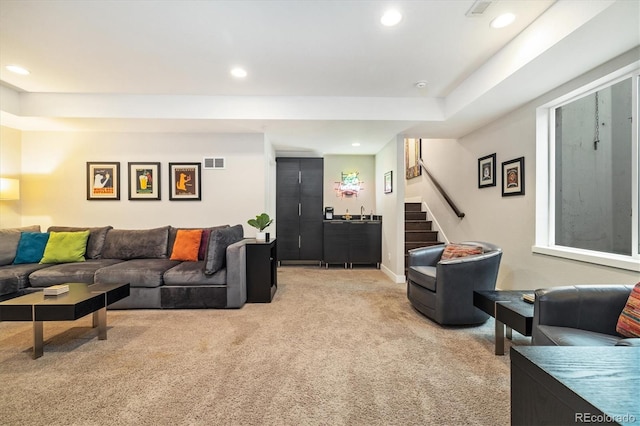 1882 W 67th Ave, Denver, CO 80221 - living room featuring light carpet, a dry bar, stairs, and recessed lighting