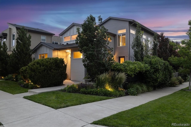 1882 W 67th Ave, Denver, CO 80221 - contemporary home featuring board and batten siding and a front lawn
