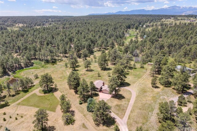 drone / aerial view featuring a mountain view