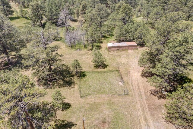 birds eye view of property featuring a rural view