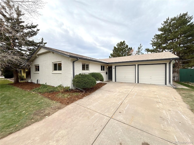 ranch-style house featuring a garage