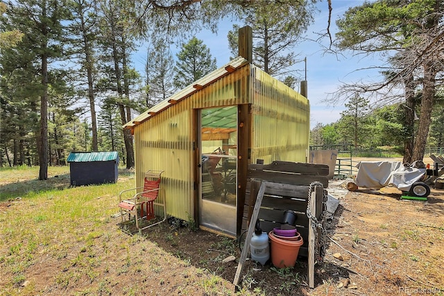 view of outbuilding featuring an outdoor structure