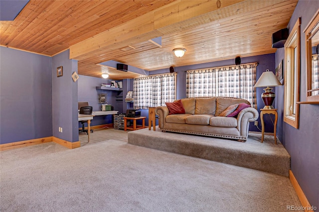 26526 Gray Buck Trl, Conifer, CO 80433 - living area with wooden ceiling, carpet flooring, plenty of natural light, baseboards, and a desk