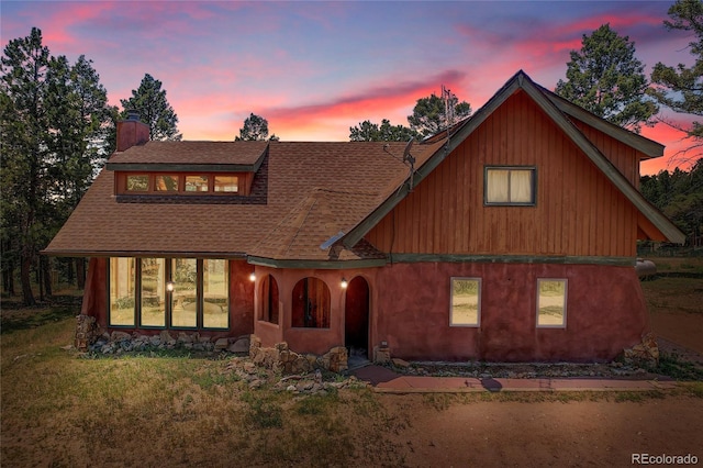 26526 Gray Buck Trl, Conifer, CO 80433 - view of front of property featuring a chimney and a shingled roof