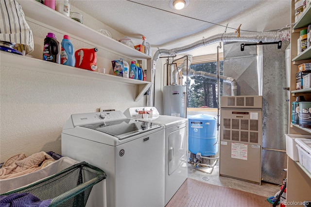 26526 Gray Buck Trl, Conifer, CO 80433 - laundry area featuring washer and clothes dryer, gas water heater, and a textured ceiling