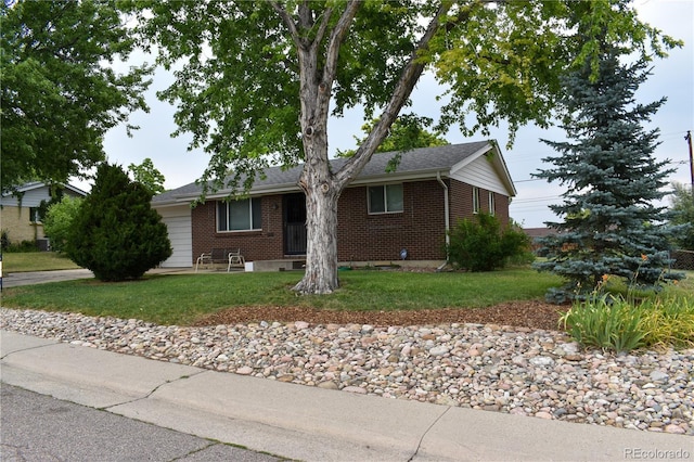 1029 W 102nd Pl, Northglenn, CO 80260 - ranch-style house with brick siding and a front lawn
