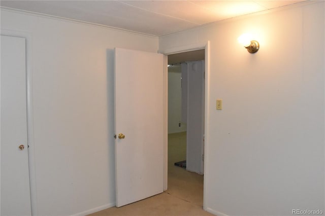 1029 W 102nd Pl, Northglenn, CO 80260 - empty room featuring crown molding and light carpet
