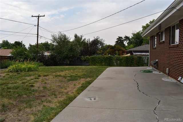 1029 W 102nd Pl, Northglenn, CO 80260 - view of green lawn with a patio area