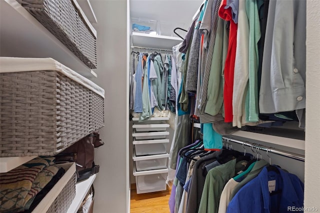 spacious closet with wood finished floors