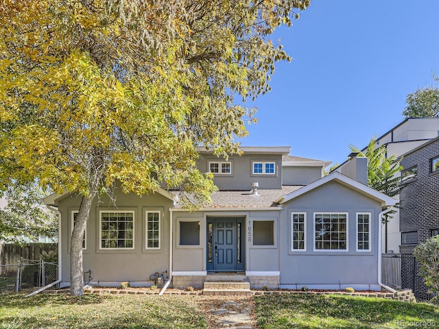 view of front of house with a front lawn