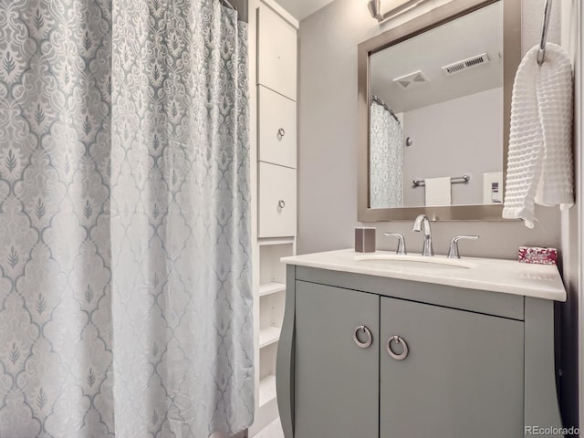 bathroom with vanity and a shower with curtain