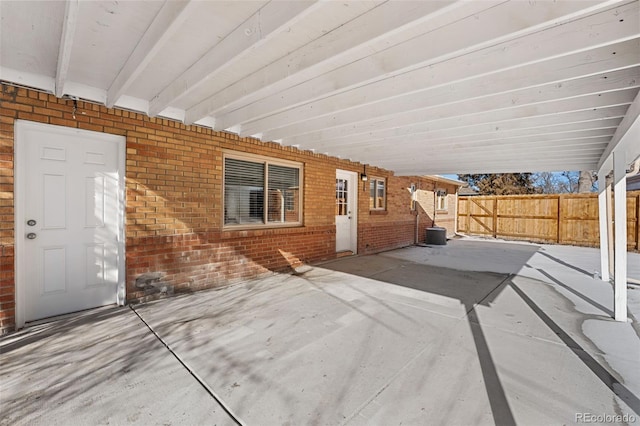 view of patio featuring fence