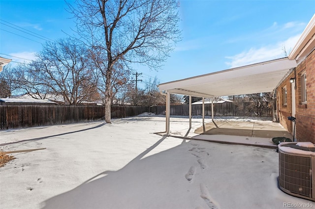 view of patio with central AC unit and a fenced backyard