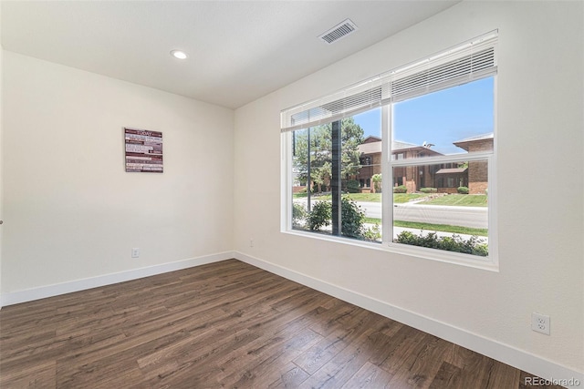 12336 W 52nd Ave, Wheat Ridge, CO 80033 - unfurnished room with dark wood-type flooring and recessed lighting