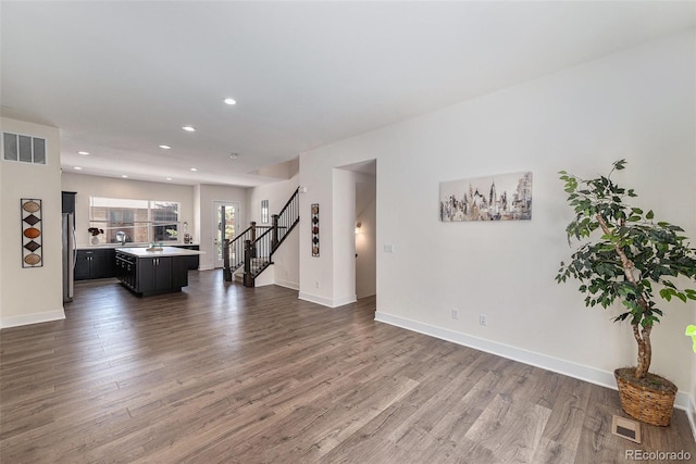 12336 W 52nd Ave, Wheat Ridge, CO 80033 - living room with wood finished floors, stairs, and recessed lighting