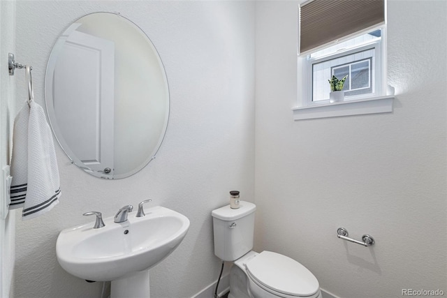 12336 W 52nd Ave, Wheat Ridge, CO 80033 - bathroom featuring a sink and toilet