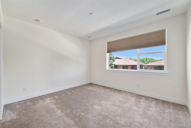 12336 W 52nd Ave, Wheat Ridge, CO 80033 - empty room with carpet floors and a smoke detector