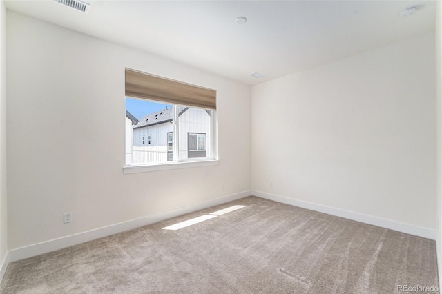 12336 W 52nd Ave, Wheat Ridge, CO 80033 - carpeted spare room featuring baseboards and a smoke detector